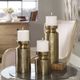 Uttermost® Amina 3-Piece Antiqued Brass Candle Holder Set-1