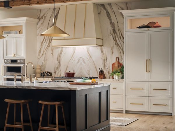 A modern built-in refrigerator installed seamlessly within custom cabinetry A modern built-in refrigerator installed seamlessly within custom cabinetry