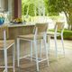 Uttermost® Calbas Honey/White Aluminum/Wicker Outdoor Bar Stool-1