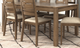 Tomali Cappuccino Rectangular Dining Table with Two Extension Leaves-0