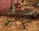Signature Design by Ashley® Rafferty Dark Brown Round Coffee Table-3