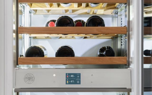 close view of a wine refrigerator with set temperatures