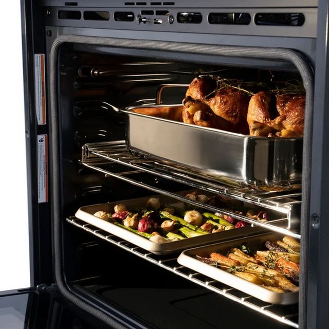 front view of modern kitchen with a jennair electric wall oven