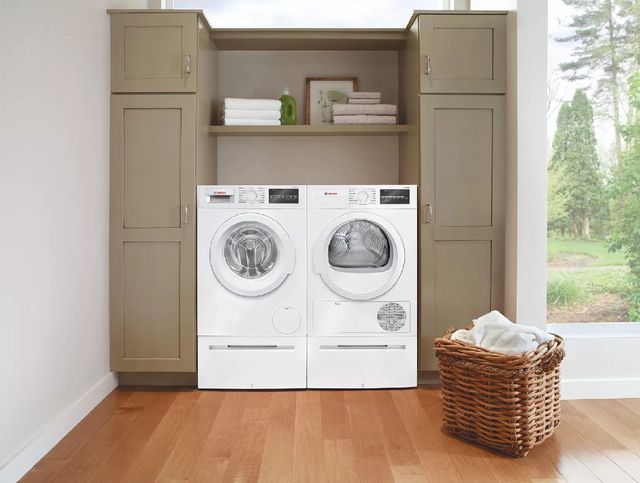 front view of the bosch 300 washer and dryer in a modern laundry room