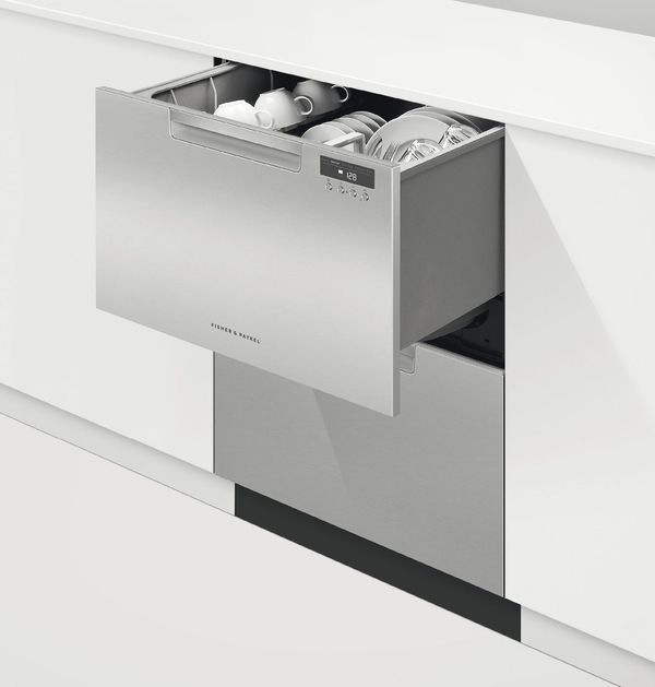 A drawer dishwasher open in a modern kitchen A drawer dishwasher open in a modern kitchen