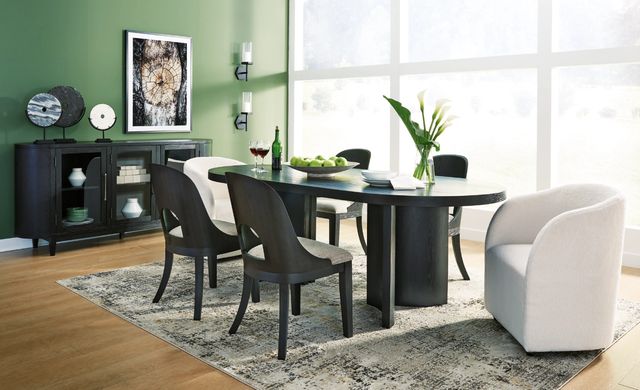 Credit: Signature Design by Ashley Front view of a contemporary dining room with a round black dining room set