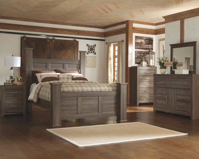 Front view of a rustic style bedroom with a Signature Design by Ashley poster bed