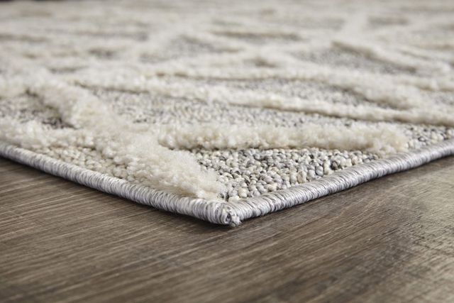 Signature Design by Ashley® Violasen Beige 5'x7' Medium Area Rug-2