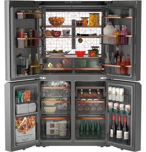 Front view of an opened Café™ 36 in. 22.9 Cu. Ft. Platinum Glass Counter Depth French Door Refrigerator