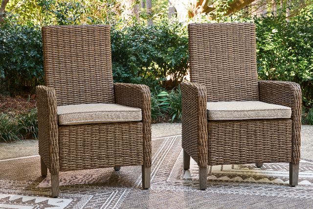 Signature Design by Ashley® Revare Beach 2-Piece Beige Fabric/Resin Wicker Outdoor Arm Chair-1