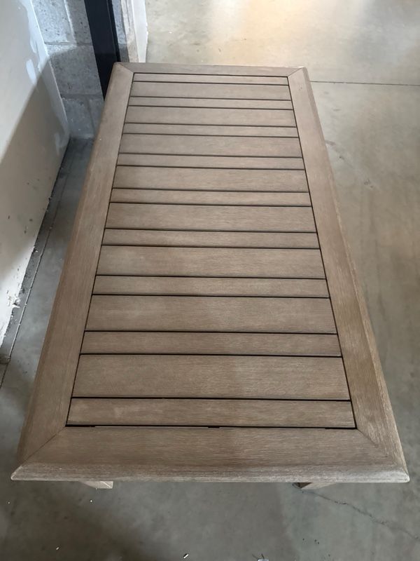Clearance Signature Design by Ashley® Gerianne Grayish Brown Wooden Outdoor Cocktail Table-1