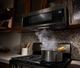 Whirlpool® 1.1 Cu. Ft. Black Stainless Over The Range Microwave-2