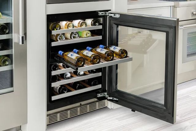Close view of an opened Thermador built in wine cooler