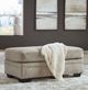 Signature Design by Ashley® Stonemeade Taupe Ottoman-3