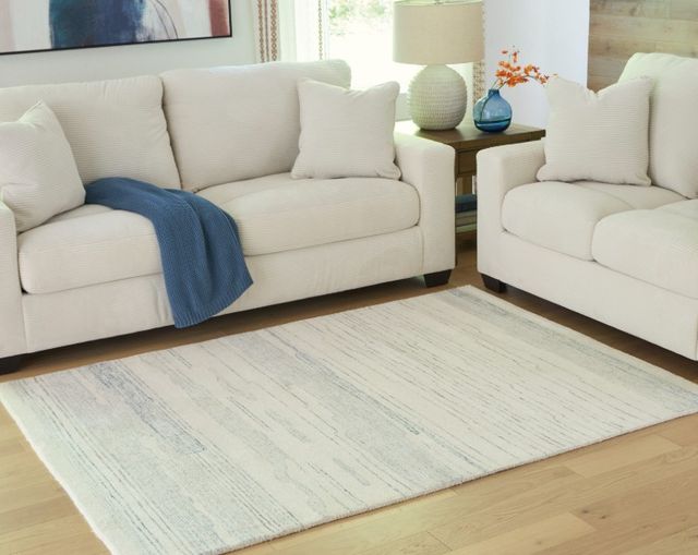 Signature Design by Ashley® Genemost Blue/Ivory 5'x7' Area Rug-3