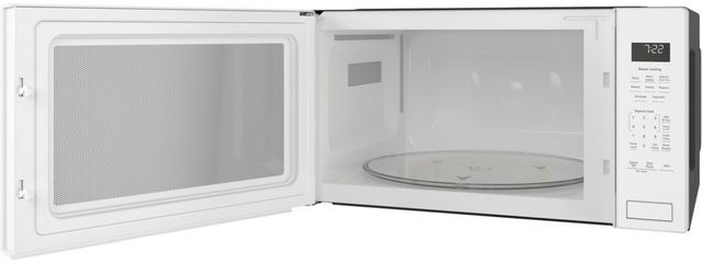 GE Profile™ 2.2 Cu. Ft. White Built In Microwave-2