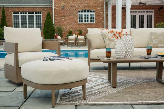 Signature Design by Ashley® Serene Bay Dark Brown/White Nuvella Outdoor Ottoman-3