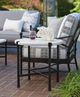 Tommy Bahama® Outdoor Pavlova Graphite Round End Table with Ivory Weatherstone Top-2