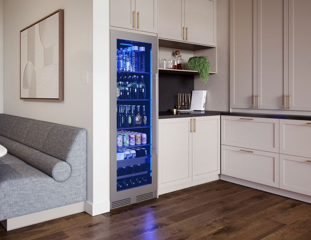 Front view of a full-size Zephyr beverage fridge with a blue LED light inside