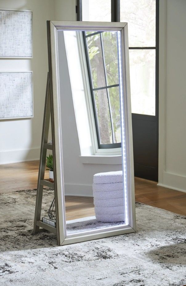 Signature Design by Ashley® Evesen Champagne Floor Standing Mirror with Storage and LED-1