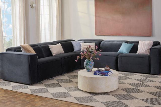 Front view of a mid-century modern living room with a Joybird sectional