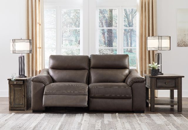 front view of a modern living room with a brown loveseat recliner