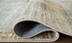 Signature Design by Ashley® Truward Caramel/Gray/Linen 5'x7' Area Rug-2