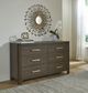 Signature Design by Ashley® Darimore Burnished Brown Dresser-1