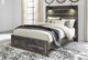 Signature Design by Ashley® Drystan Brown Queen 2-Drawer Storage Panel Bed-4