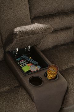 Benchcraft® Dorman Chocolate Manual Reclining Loveseat with Console