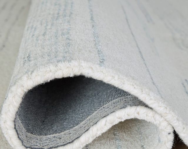 Signature Design by Ashley® Genemost Blue/Ivory 5'x7' Area Rug-1