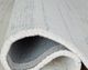 Signature Design by Ashley® Genemost Blue/Ivory 5'x7' Area Rug-1
