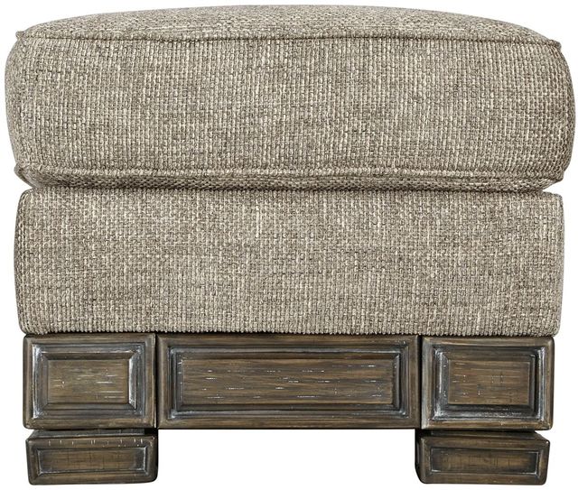 Signature Design by Ashley® Einsgrove Sandstone Ottoman-1