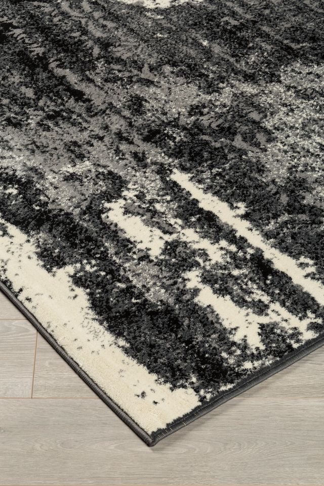 Signature Design by Ashley® Roskos Black/Gray 5'x7' Medium Area Rug-0