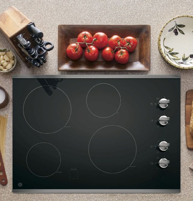 GE® 30" Stainless Steel on Black Electric Cooktop-3