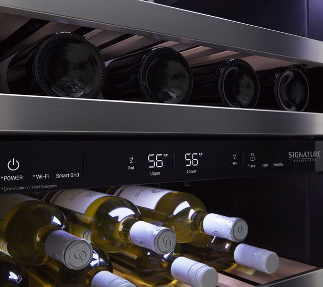 Close view of a dual zone wine cooler showing the different temperatures for each section