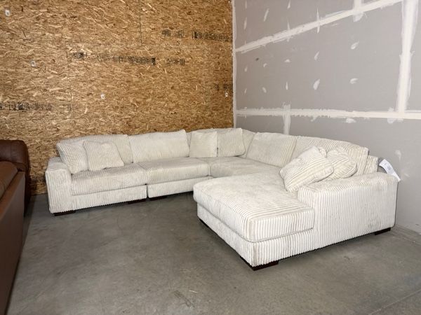 Clearance Signature Design by Ashley® Lindyn 5-Piece Ivory Right-Arm Facing Sectional and Chaise-0
