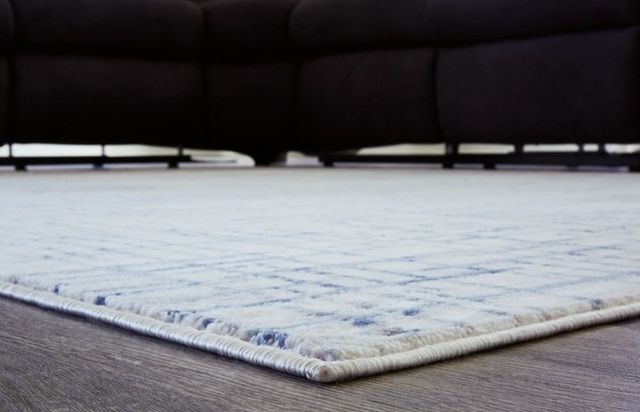 Signature Design by Ashley® Beckfille Blue/Cream/Gray 5' x 7' Medium Area Rug-1