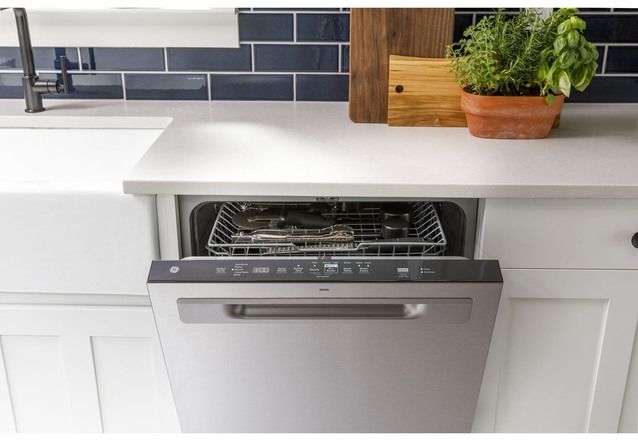 front view of a modern kitchen with a slightly opened GE Dishwasher