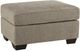 Benchcraft® Olten Mocha Ottoman-0
