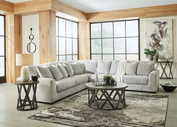 front view of a rustic living room with a grey l-shaped sectional sofa
