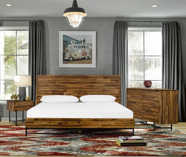 front view of a modern bedroom with a queen size wooden bed frame