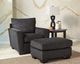 Benchcraft® Wixon Slate Ottoman-1