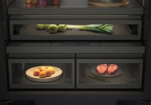 Front view of inside a Gaggenau refrigerator with multi-zone cooling