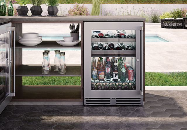 Front view of a built in glass door outdoor wine cabinet