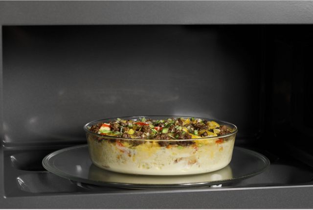 Café™ 2.1 Cu. Ft. Stainless Steel Over The Range Microwave-5