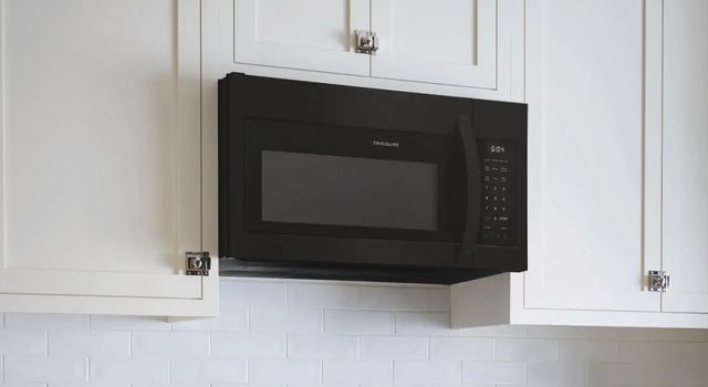 Frigidaire® 1.8 Cu. Ft. Black Over The Range Microwave-3