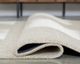 Signature Design by Ashley® Wolbert Ivory/Tan 8'x10' Area Rug-1