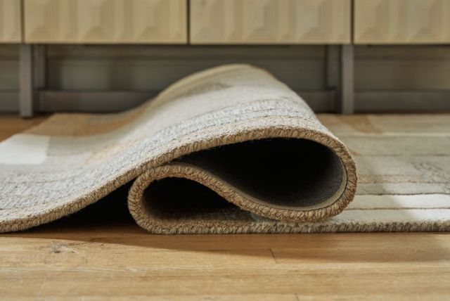 Signature Design by Ashley® Abbotton Caramel/Gray/Taupe 5'x7' Area Rug-1