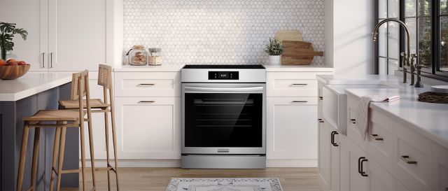 Front view of a modern kitchen with a Frigidaire electric range 